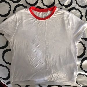 White shirt with red neckline